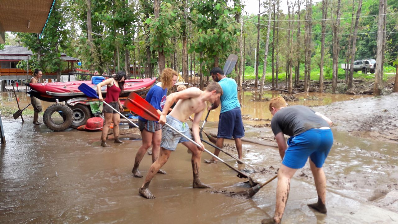 Volunteers cleaning after flood in Sop Win